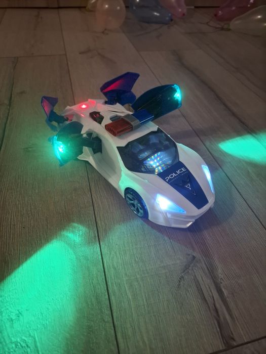 Masina politie - lumini , sunet , se învârte - produs nou