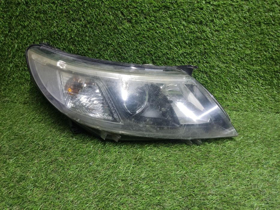 Фара   Saab  9-3