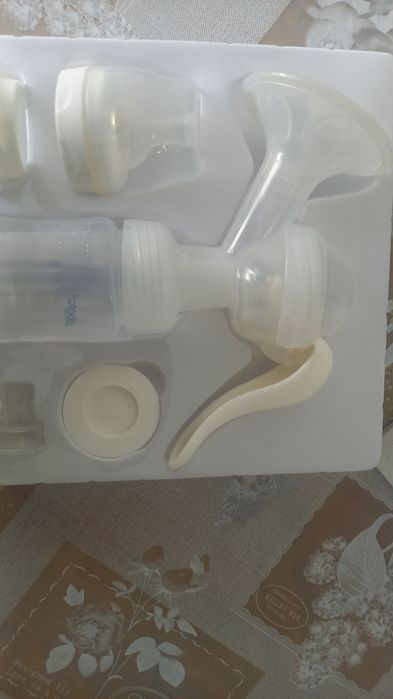 Продается молокоотсос с бутылкой 2в1