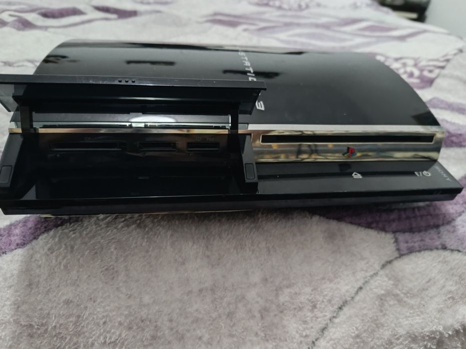 PS3 CECHC04 pentru cunoscatori + controller Sony original