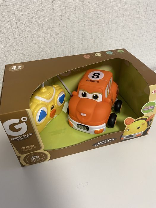 Радиоуправляема анимационна кола в оранжево, с дистанционно