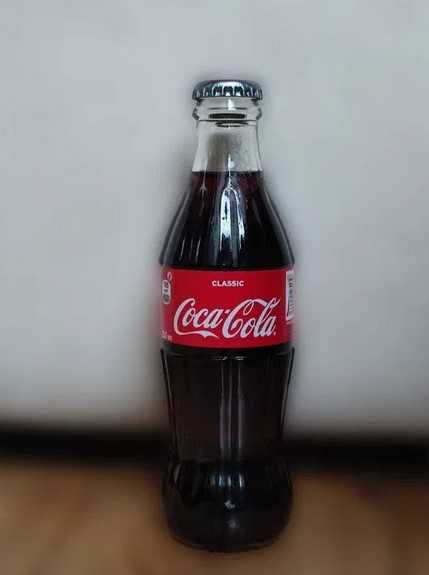 Пълни, неотваряни бутилки Кока-Кола, внос