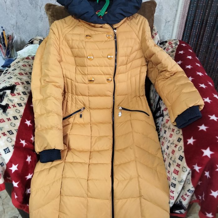 Продам пуховик осень