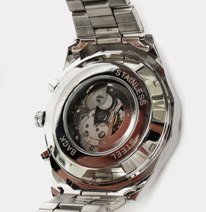 Mexanik soat, zanglamas po'latdan, namlikka chidamli, strelkalari tund