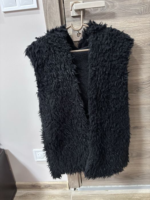 Пухен елек.