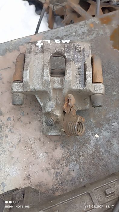 Суппорт задний Мазда 3 Mazda 3