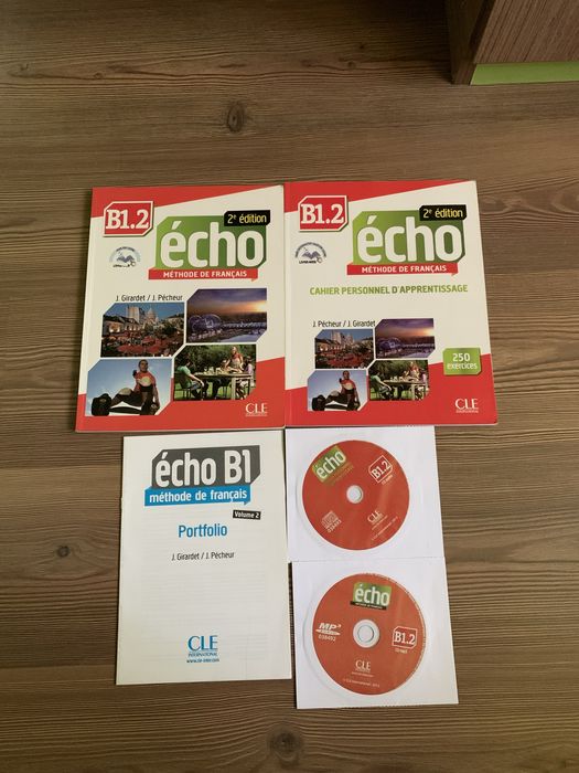 Учебници по френски език Echo и английски език Solutions