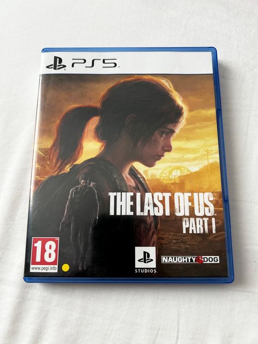 PS5 + 2 controllere + 2 jocuri + incarcator