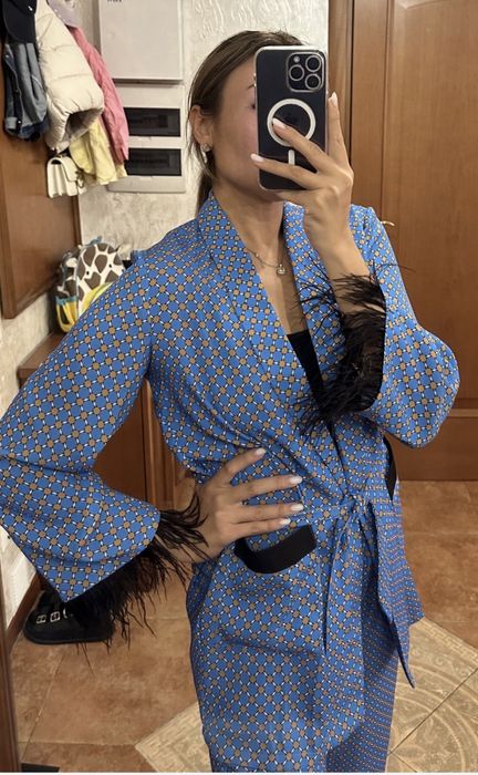 Двойка с перьями