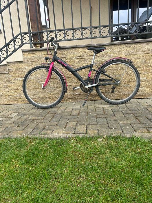 Vând bicicleta de fete BTwin cu roti de 24