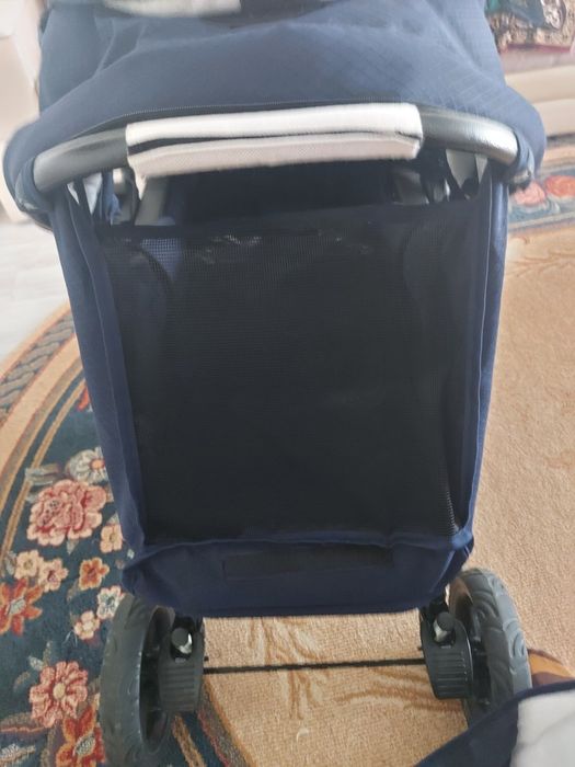 Коляска с регулируемой ручкой