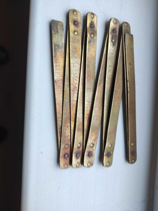 Стар бронзов сгъваем метър