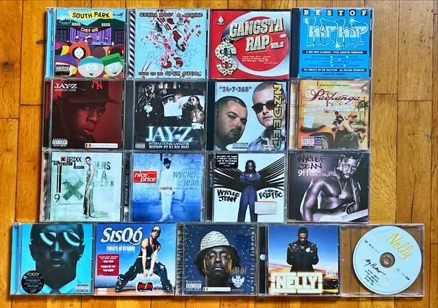 CD orig hip hop: Snoop Dogg, 50 Cent, Beastie Boys, Akon, Jay-Z, W. Jean, Coolio, 2Pac