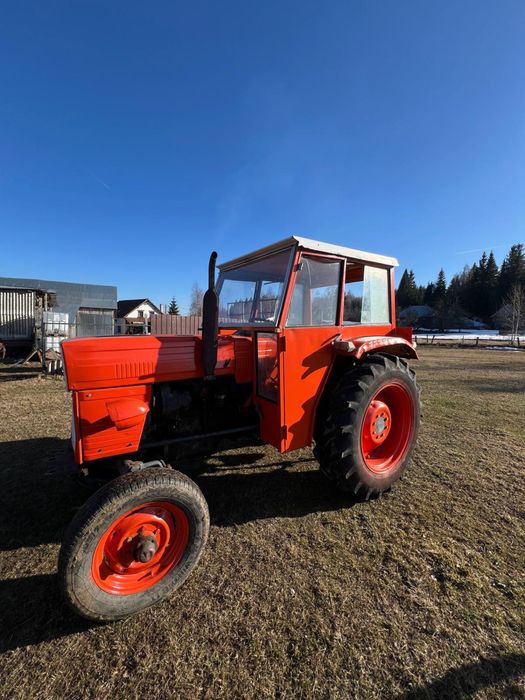 Vand tractor universal 445 UTB cu plug disc si cupa in tiranț