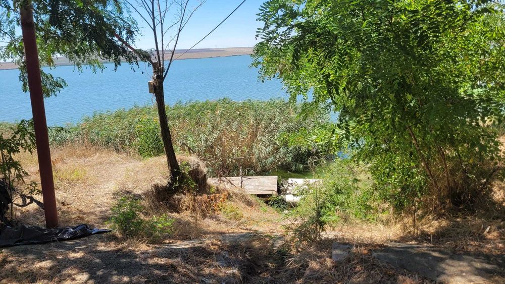 Teren cu Ferma si Livada cu deschidere la lacul Tasaul