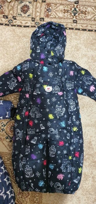 Детские зимние комбинезоны.