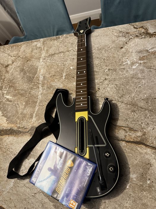 PlayStation 4 1TB + 2 manete originale + Guitar Hero Live (cu chitara)