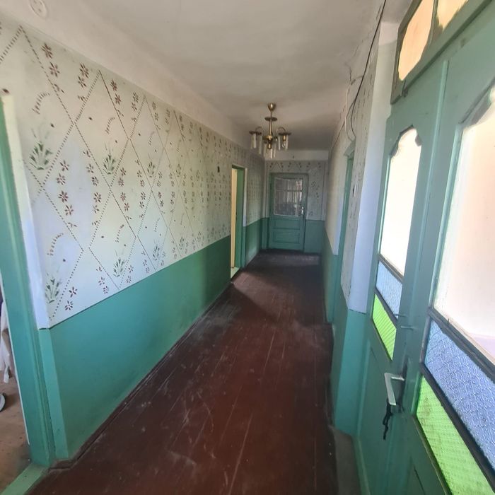 Casa de vanzare in comuna Coteana cu teren generos