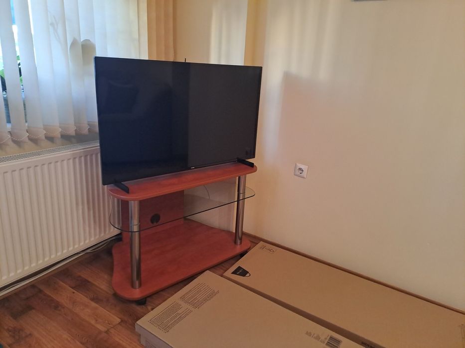 ТВ шкаф с трапецовидна форма