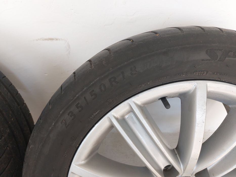 4 jante Volkswagen  aluminiu cu tot cu anvelope  de vara Dunlop