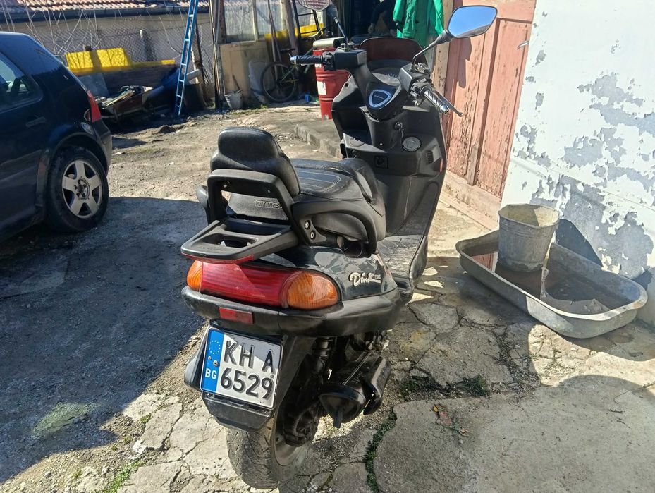 Скутер Кумко Динк 150