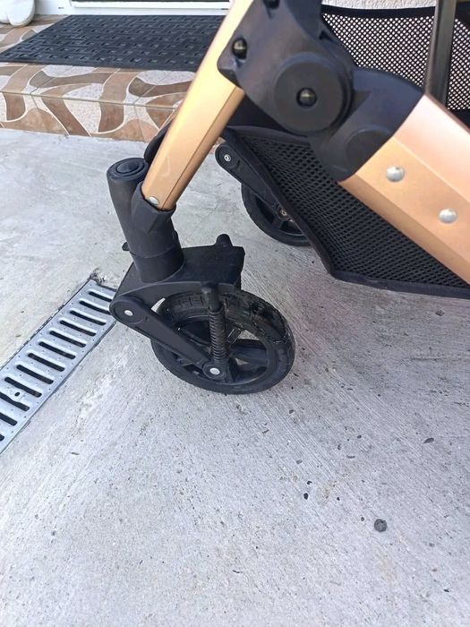 Carucior 3 in 1 cu suspensii duble