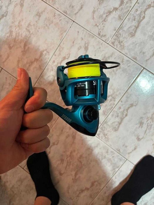 Фидер въдица FL която е с леки следи от употреба както и макарата FL