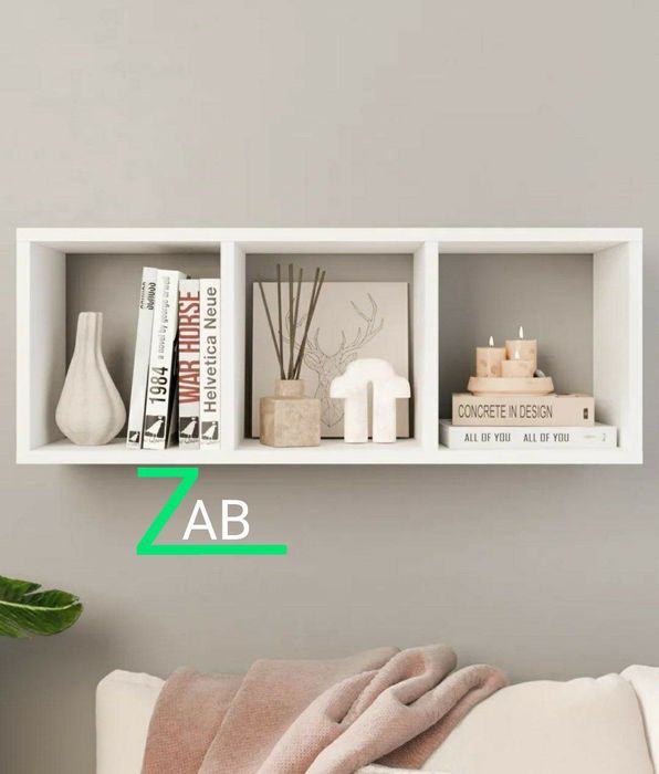 Навесная книжная полка удачное решение для гостиной и под телевизор.