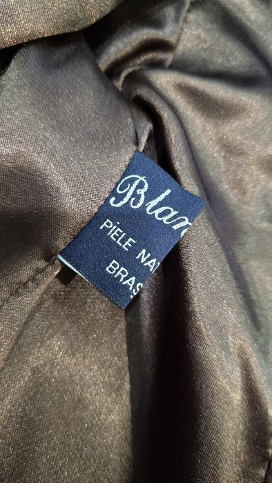 Vestă și haină de blană