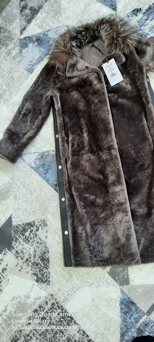 200 000тг.новый дубленка.размер 48