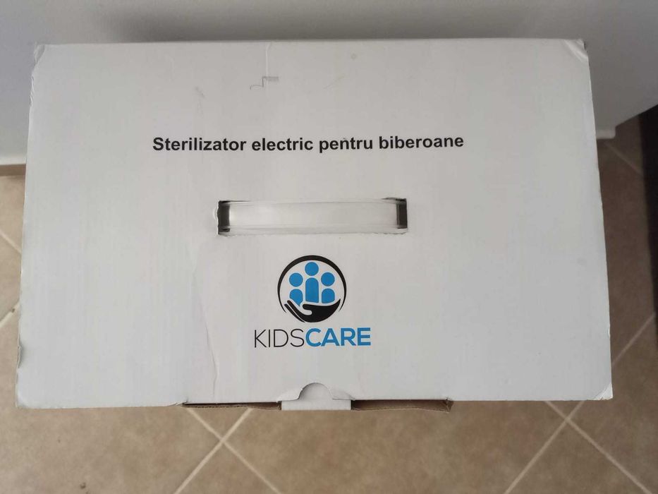 Sterilizator biberoane KidsCare ca nou, la cutie