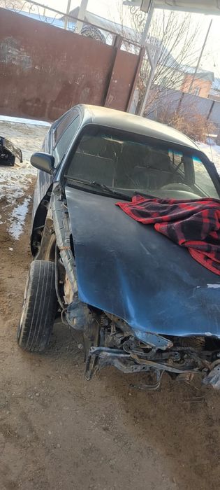 Тойота Карина Е аварийная