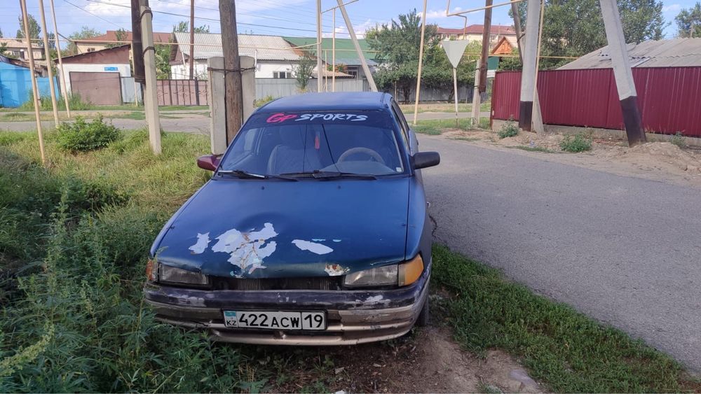 Срочно мазда 323