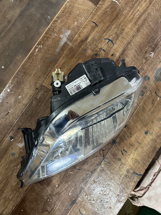 Фара Рено Логан оригинал левая