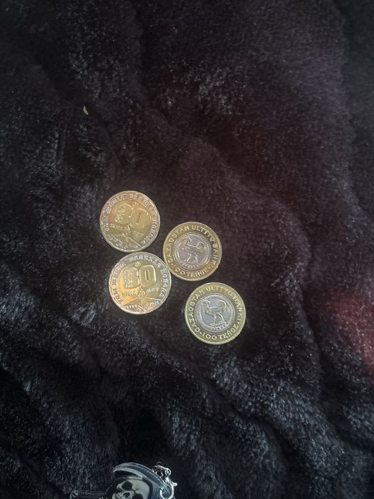 Продам коллекционные монеты 80 летие казахстана и 100 тг