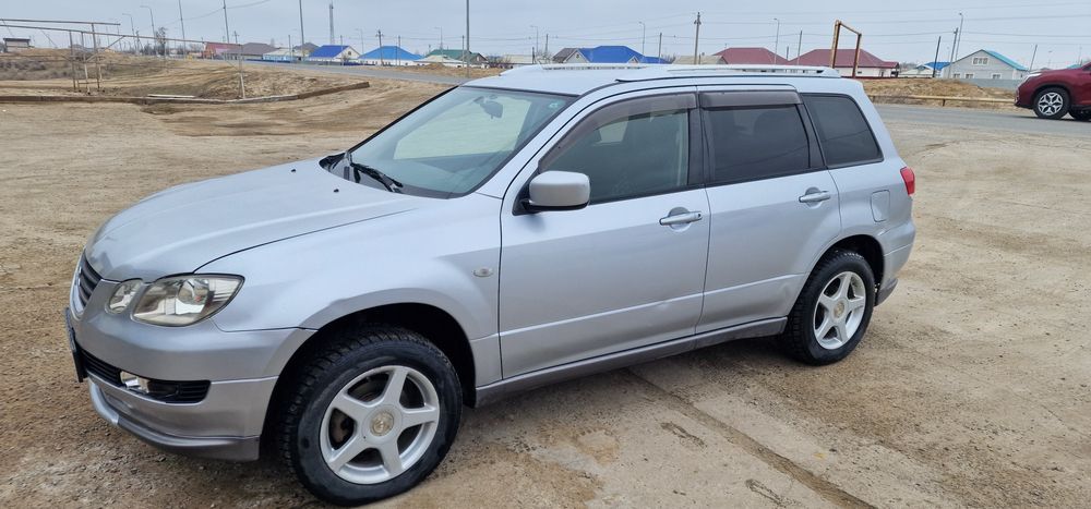 митсубиси айртрек 2003