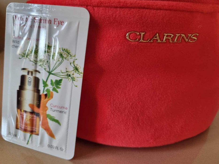 Несесер/Козметична чанта Clarins