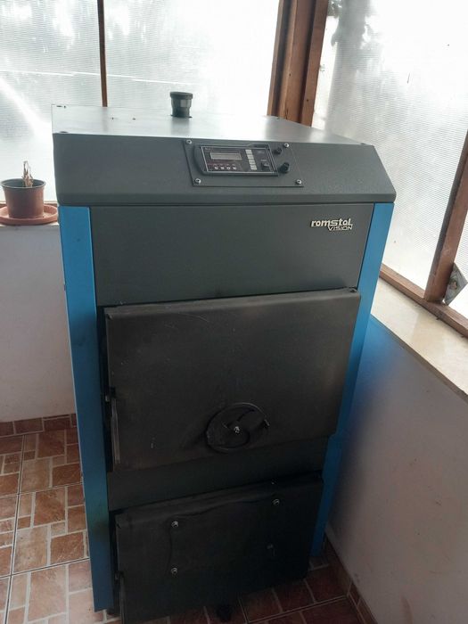 Vând centrală pe lemn