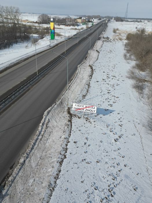 11 микрорайон при вьезде слева