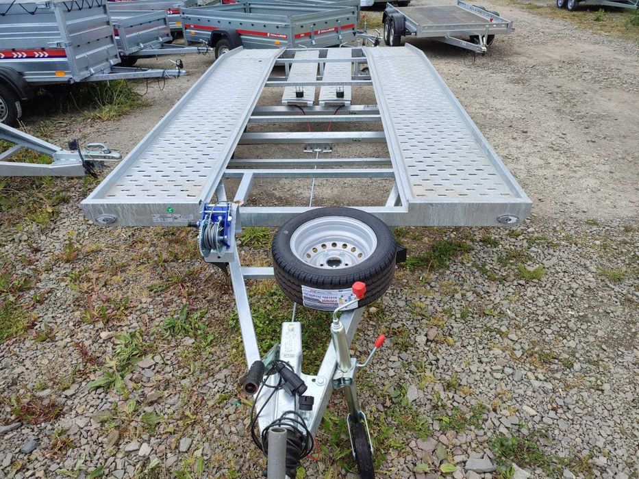 Platforma - Trailer 4,5 sau 5 m 2000-2700Kg  aplecată spate