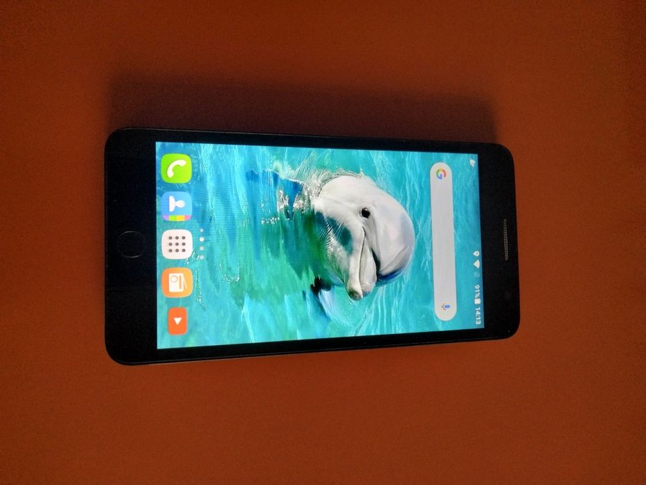Телефон Alcatel one touch