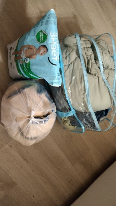 Комбинезон, пакет вещей до 2 года.