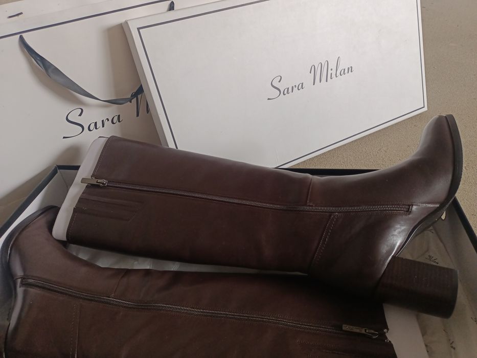 Женские сапоги и пуховик