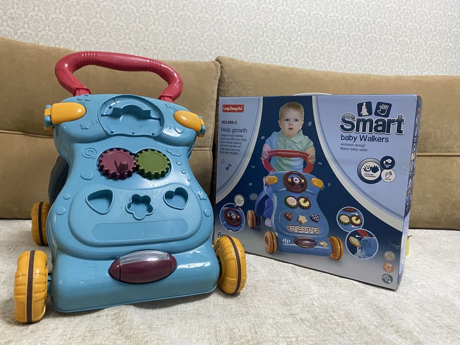 Детские ходунки каталка «Smart Baby Walker»