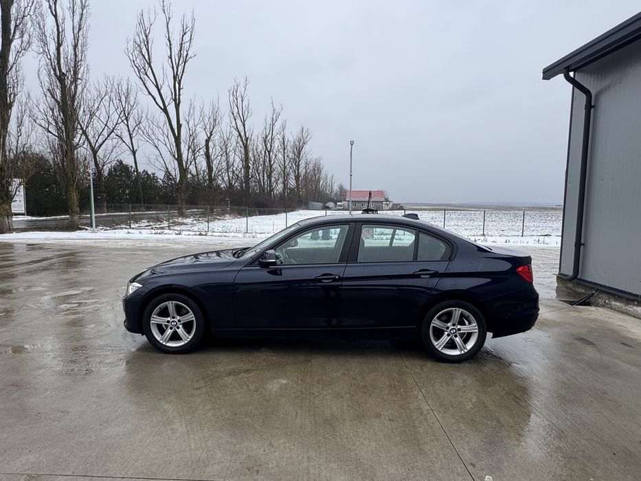 Bmw Faruri bi xenon/navigatie/senzori fata spate/jante/rate/garantie