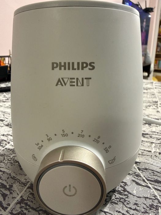 Уред за затопляне на шишета