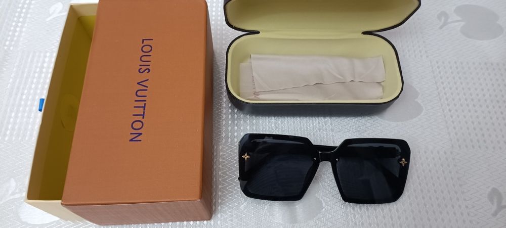 очки солнцезащитные