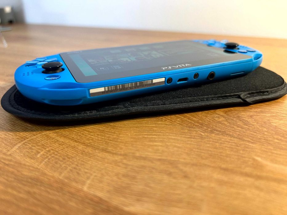 PS Vita Slim Aqua Blue modată — 128GB, gata de joc
