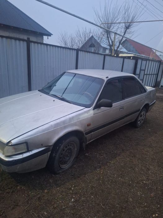 Мазда 626.