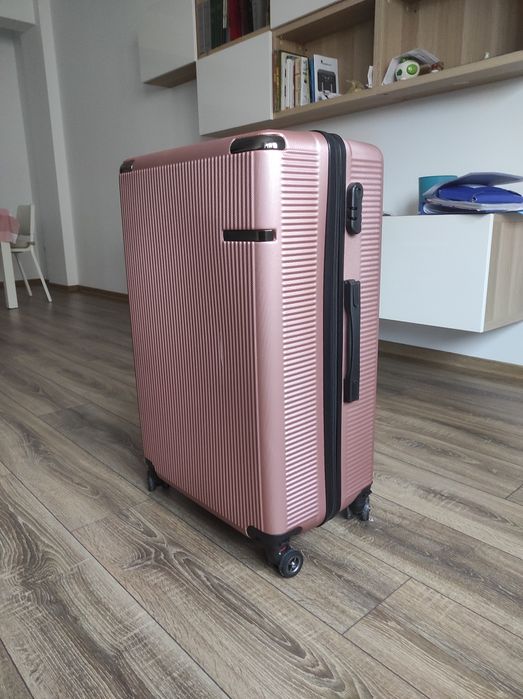 Valiză roz cu roți detașabile